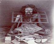 An Indian ascetic wearing an iron collar around his neck so that he can never lie down 1870s. from indian girl wearing dr