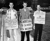 From left: Buddy Trammell, Max Stiles, and Tommy Sanders, students at Clinton High School in Clinton, Tennessee, picket their school when it becomes the first state-supported school to integrate, on Aug. 27, 1956. from mms school in