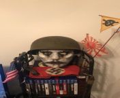 A little display for my American Vietnam war helmet that has a bullet ricochet mark on top. A parade rising sun flag. Thats my first German armband and it even has blood in it. The yellow flag was used by Germans to mark areas with mines or gas contamina from mark oronea