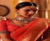 Imagine Kiara dressed in a red saree with jewellery and waiting the bed for Suhagrat from indian first night suhagrat saree with