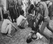 Newly independent Bangladesh guerrillas use bayonets to torture and kill four men suspected of collaborating with Pakistani militiamen, Dhaka, 1972 [25001754] from bangladesh dhakacoup