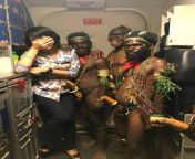 Passengers from Papua New Guinea pose for a pic with the air-hostess :) from air hostess blwjob bathroom
