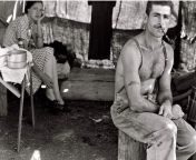 Man and his wife work the bean harvest in Oregon 1939. Notice the man has his Social Security number tattooed on his arm from man goy his cowamp dogamp petlust com
