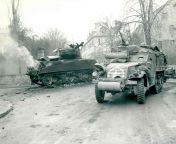US Army halftrack passes a still smoking M4 Sherman of the US 48th Tank Battalion that was knocked out by a &#34;Tiger&#34; the night before, 29 November 1944. US Army photo by Clifford O. Bell from us army guy shower sextape mp4