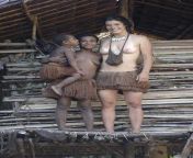 Reupped post: snowboarder Mellie Francon with Papua tribe (this pic disappeared from the sub after the Imgur NSFW purge and was in better resolution). If anyone can find the original quality, I&#39;ll be thoroughly impressed as these pics seem rarer thanfrom papua jogja