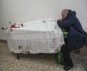 [Graphic] Serhii, father of teenager Iliya, cries on his son&#39;s lifeless body lying on a stretcher at a maternity hospital converted into a medical ward in Mariupol, Ukraine, Wednesday, March 2, 2022. (AP Photo/Evgeniy Maloletka) from maloletka 3gp