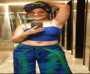 Jolly Bhatia navel in blue sleeveless top and blue-green pant from 12 xxx girl and blue film co