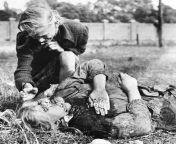 [History] A ten-year-old Polish girl named Kazimiera Mika mourns over her sister&#39;s body. She was killed by German machine-gun fire while picking potatoes in a field outside Warsaw, Poland, in September of 1939 from ten yr old kenyan girl sex