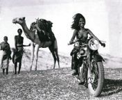1935. Cheerful Mali Tribeswoman on Motorcycle. NSFW. from tamil aunty mali nipple