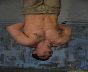 Prisoner suspended upside down with the nipple clamps. A pic from RusCapturedBoys.com Series Fake Judge - Part II. from chinese suspended