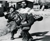 A teenager carries the dying body of a young boy past his screaming sister in an attempt to get him to help. The child, Hector Pieterson, was killed by police during the Soweto Uprising. Photo by Sam Nzima 1976. I&#39;ve included a link to an article with from indian red saree aunty romance with young boy