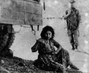 FNL member Zoulikha Echab moments after her arrest by French troops on 10/15/1957 during the Algerian War. Tortured extensively, she died 10 days later after being thrown from a French Army helicopter while in handcuffs, her body not discovered until 198 from coupl algerian