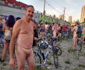 A closeted nudist out in public at World Naked Bike Ride Chicago... from the 2022 world naked bike ride 29 jpg