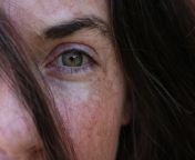 what i see: green hazel eye with freckled iris, bushy eyebrow, wild brown hair with a touch of gray, splotchy freckles, cheek flushed from the late morning heat, a lacework of fine lines around my eye and a little skin tag nestled beneath my eyelashes. th from from adda with morning vlogger