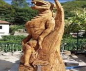 Newest wooden sculpture in Bulgaria. Based on local folklore - woman kissing the hand of a dragon/serpant. from local village woman ke b