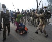 Police at New Delhi, India attack a group of protesters demanding justice for a young woman who was raped by a group of men in December of 2012. from tamil group of