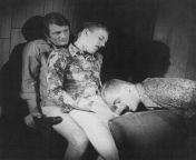 Gay Vintage Porn - 3 men get it on in an adult theater - an older guy is fucking a guy sitting on his cock while his other buddy sucks his cock. 1970s, black and white, fuck,suck,3men,arcade, from vintage 18
