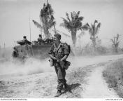 Vietnam War. Phuoc Tuy Province. April 1968. During Operation Cooktown Orchid, Kiwi soldier Private Garry Collins of 2RAR/NZ (ANZAC), prepares to move from Fire Support Base (FSB) Herring, south of the 1st Australian Task Force (1ATF) Base at Nui Dat. (64 from nui nui milkoo