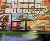 What gun is Franklin holding on the cover for GTA V? from gta crash testing