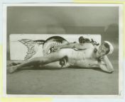 Gay Vintage Porn - nude man in a sailor hat reclining next to a rectangular object with a painting of an Asian sea creature - black and white 1950s-unidentified private collection scan - 1man,uniform from adela popescu porn nude
