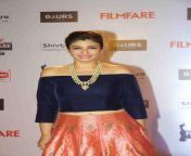 Raveena Tandon Red Carpet in a traditional blue blouse and red lehenga from raveena tandon hot kess in car
