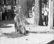 Flames engulf Buddhist priest Ho Dinh Van as he self-immolates in front of the Saigon Roman Catholic Cathedral as protest against the Ngo Dinh Diem government of South Vietnam. 27 October 1963. from hack camera gia đình