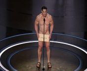 PsBattle: John Cena at Oscars 2024 presenting the award for best costume design from john cena 2024 movies