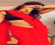Kajal Tiwari navel in red saree and black sleeveless blouse from saree sleeveless blouse hot