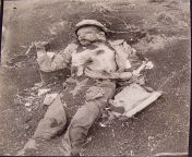 [History] Dead U.S. Marine on Iwo Jima, February 20, 1945. from iwo hpo ore