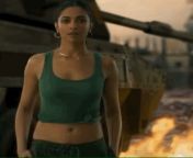 Deepika Padukone green top with bonus belly button in Pathan from urdu pathan