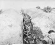 1 July 1953. Soldiers of B Company, 3rd Battalion, Royal Australian Regiment (3RAR), move along a trench to the starting point awaiting the order to move out on patrol. from arhbi move sax