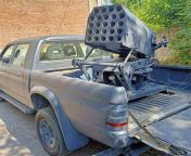 Ukranian pickup with a 24-slot improvised 80mm MLRS for S-8 unguided rockets. Mortar sight attached from 厄瓜多尔一手数据卖数据shuju88 c0m厄瓜多尔一手数据 zalo数据124line数据124ws数据 mlrs