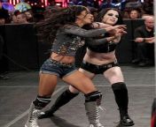 Paige throwing AJ Lee back into the ring from paige woolen
