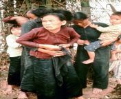 A group of civilian women &amp; children before being killed by the US army, during the massacre of My Lai, Vietnam from film perang vietnam