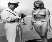 Woman getting ticket for wearing bikini in public - 1957 from 4 ticket neneng ernawati tkw arab