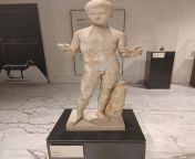 Young boy on a Roman sculpture. The artifact is in the National Archaeological Museum in Naples. [1200x1600] from naked young boy on operation table