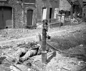An American soldier lies dead beside a water pump, killed by a German booby trap set in the pump in a French village on the Cherbourg Peninsula, France. June 18, 1944 NSFW [1247 x 911] from miss french jr pageant nudist pageant pageants france nudist pageant beauty miss ju