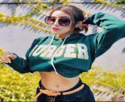 Ena Datta navel in green jacket and dark blue jeans from ena datta nude model