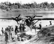WWII. New Guinea Campaign. January 1943. A PBY-5 Catalina of US Navy Patrol Squadron VP-11 on the Sepik River bringing supplies to a coastwatcher working in the area. (1528 x 1191) from meri sepik koap 3gp