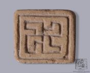 Swastika seal, 2700 BCE, found at Mohenjodaro, Indus valley civilization. On display at National Museum, New Delhi, India.[18001747] from new niks india