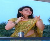 Kajal agarwal wants us to take a look at something. Can u guys guess what that is? from kajal gif