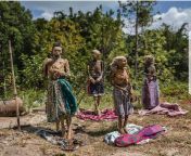 A rare death ritual in Indonesia. Family members gather to remove their relatives from their graves, change their clothes, dust them off, and let them dry in the sun. Credit to Nat Geo. from ibu stw gemuk indonesia