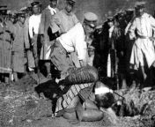 Japanese soldier beheading an Atayal tribe fighter during their military repression in Taroko, 1914. from nude beheading