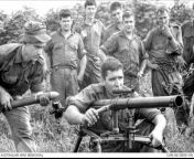 Phuoc Tuy Province. October 1966. Soldiers load a Chicom 57mm recoilless rifle captured by troops of D Company, 6th Battalion, Royal Australian Regiment (6RAR), during the Battle of Long Tan. from mypornsnap pimpandhost nude d company lsp 00