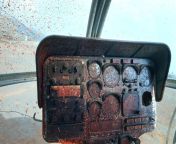 Photo taken by Denis Cameron showcasing the blood splattered dashboard and windshield inside a cockpit of a OH-6 Cayuse reconnaissance helicopter, after its pilot 1st Lt. Morris Butch Simpson was killed by heavy anti aircraft fire during a mission overfrom mayday alarm im cockpit aloha honullu