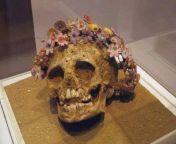 Skull of a young girl found at a cemetery in Patras, Greece. She was buried wearing a wreath made of ceramic myrtle flowers (3rd century BC). from exploits of a young don juan film