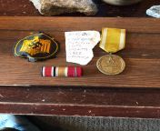 All if my German WWII items to date, NSRL patch, West Wall medal, and a ribbon bar with an eastern front, west wall, and iron cross medals from eastern sister