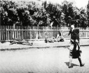Two people walk past starving peasants who lie dead or dying on the sidewalk. Kharkiv, Ukraine, 1932, during the Holodomor, the horrific deliberately engineered famine in Ukraine that killed up to 12 million people. from desi bhabhi caught by village people desi videos semi nude