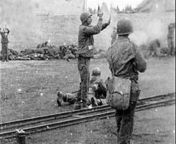 Lt. Col. Felix Sparks attempts to end the slaughter of SS guards during the Dachau Reprisals, April 1945. from www feni jheya muila col