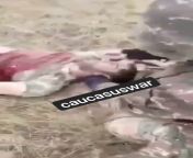 Footage of an Armenian soldier cutting the ear of a dead Azerbaijani soldier. from prema aun